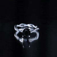 Oval Shaped 1.7 Carat Black Onyx and Diamond Braided Engagement Ring