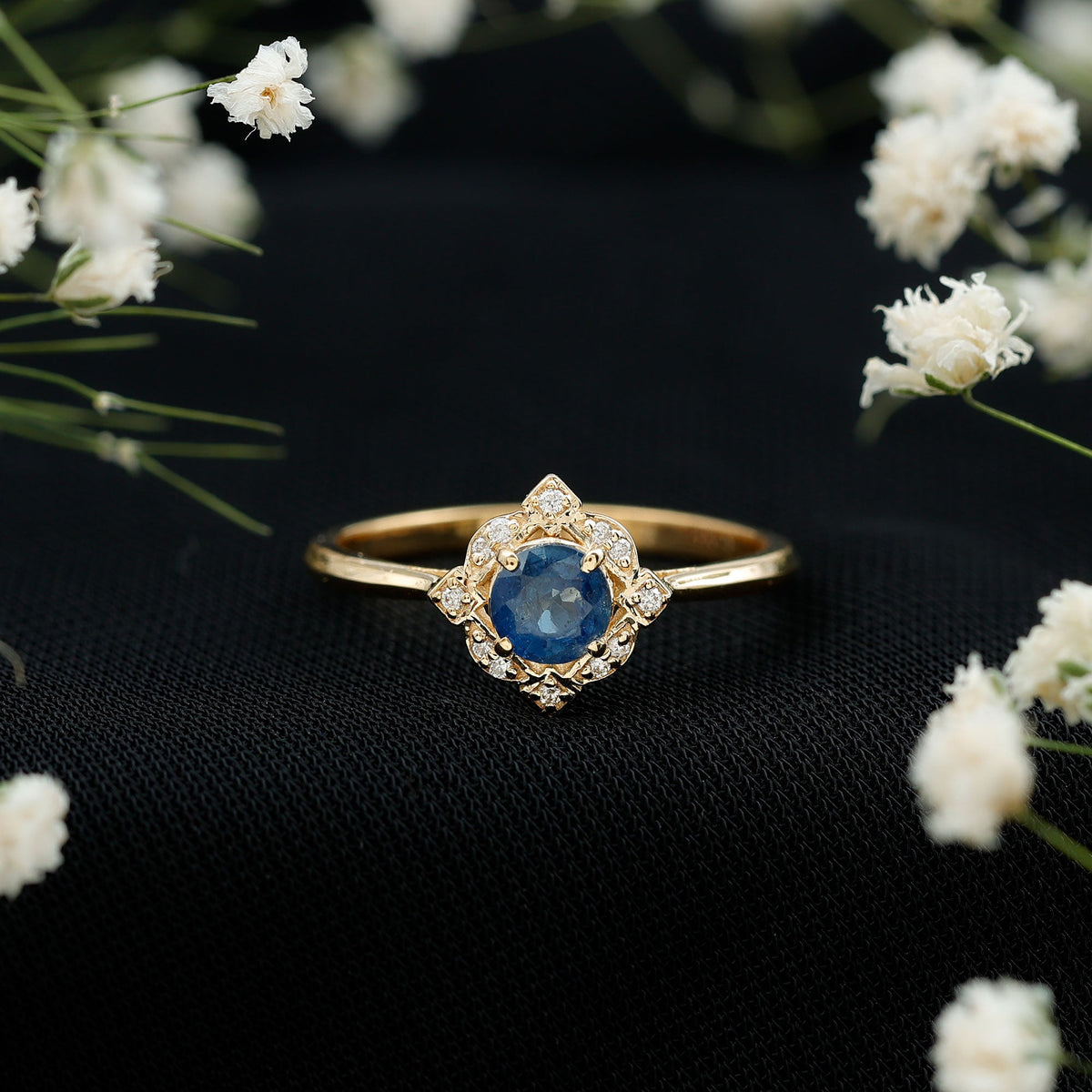 Vintage style 0.9 carat blue sapphire engagement ring with diamond halo by Rosec Jewels, showcasing intricate design and sparkling gemstones.