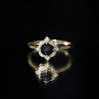 Round Cut Black Onyx and Diamond Flower Engagement Ring