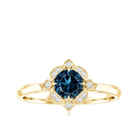 Round Cut London Blue Topaz and Diamond Flower Engagement Ring