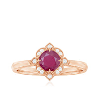 Vintage style 0.6 carat ruby engagement ring with diamond halo by Rosec Jewels, showcasing the detailed design and sparkling stones.