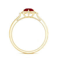 Vintage style 0.6 carat ruby engagement ring with diamond halo from Rosec Jewels, featuring intricate metalwork and sparkling stones.