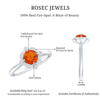 Vintage 1/2 CT fire opal and diamond engagement ring by Rosec Jewels featuring a stunning gemstone and intricate metalwork.