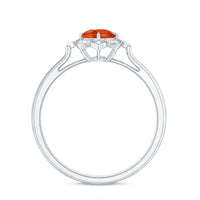 Vintage 1/2 carat fire opal and diamond engagement ring with intricate gold setting by Rosec Jewels.