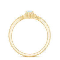 Rosec Jewels 1/2 CT moonstone and diamond bypass promise ring featuring a delicate band and sparkling gemstone accents.