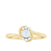 Moonstone and diamond bypass promise ring by Rosec Jewels, showcasing sparkling gemstones in a sleek, elegant design.