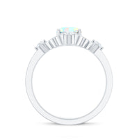 Ethiopian Opal and diamond engagement ring by Rosec Jewels featuring a central opal gemstone with diamond accents in a elegant design.