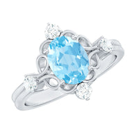 Art Deco style 1 carat oval aquamarine and diamond cocktail ring by Rosec Jewels, showcasing intricate design and sparkling gemstones.