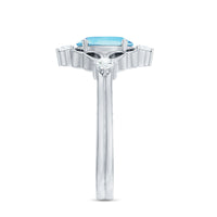 Art Deco style 1 carat oval aquamarine and diamond cocktail ring by Rosec Jewels, showcasing intricate design and sparkling gemstones.