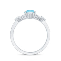 Art Deco style 1 carat oval aquamarine and diamond cocktail ring by Rosec Jewels, showcasing the intricate design and sparkling gemstones.