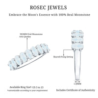 Oval cut moonstone half eternity wedding band ring by Rosec Jewels with a continuous row of moonstones in a silver setting.