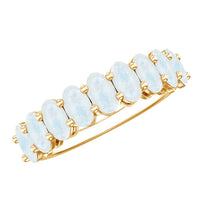 Oval cut moonstone half eternity wedding band ring with alternating moonstone and metal setting, crafted by Rosec Jewels.