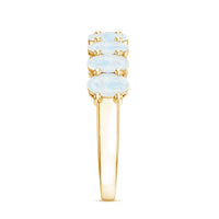 Oval cut moonstone half eternity wedding band ring by Rosec Jewels with alternating moonstone gemstones on a silver band.