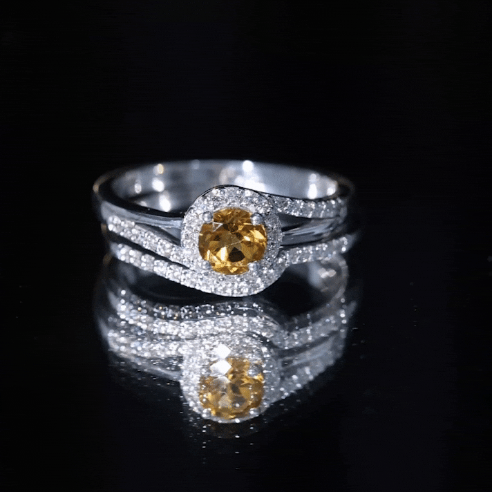 Genuine citrine engagement ring with diamond wedding band, showcasing yellow citrine and sparkling diamonds on a silver setting.