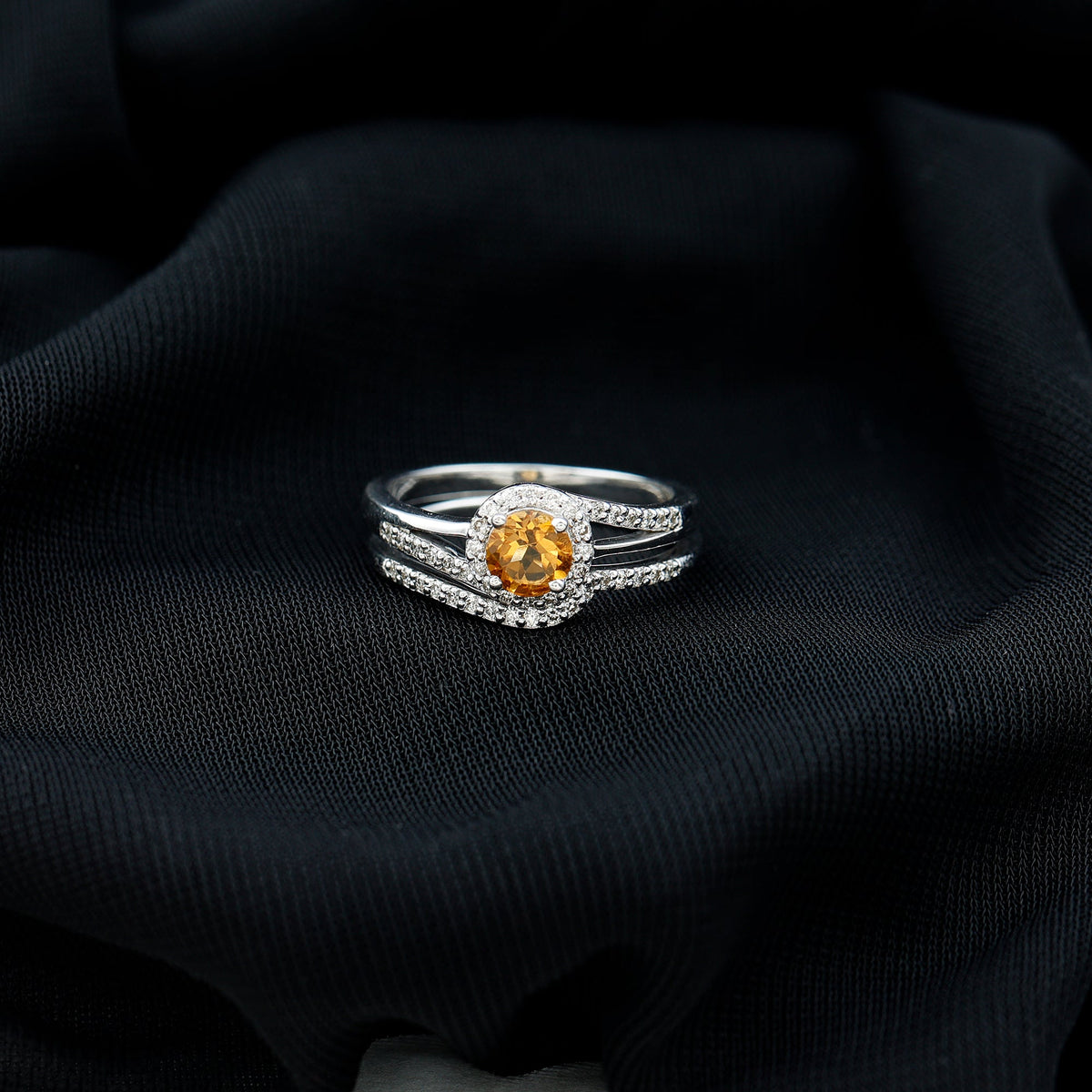 Genuine citrine engagement ring with diamond wedding band, featuring a large yellow citrine gemstone and sparkling diamond accents.