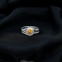 Genuine citrine engagement ring with diamond wedding band, featuring a large yellow citrine gemstone and sparkling diamond accents.