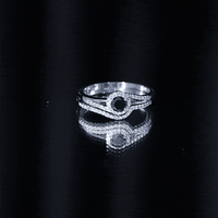 Black Onyx and diamond curved wedding rings set by Rosec Jewels, featuring sleek black onyx and sparkling diamonds in a minimalist design.