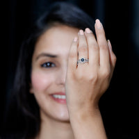 Black Onyx and diamond curved wedding rings set by Rosec Jewels, featuring sleek black onyx stones and elegant diamond accents.