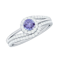 Genuine Tanzanite engagement ring with diamond enhancer featuring a violet-blue tanzanite gemstone and sparkling diamonds in a rose gold setting