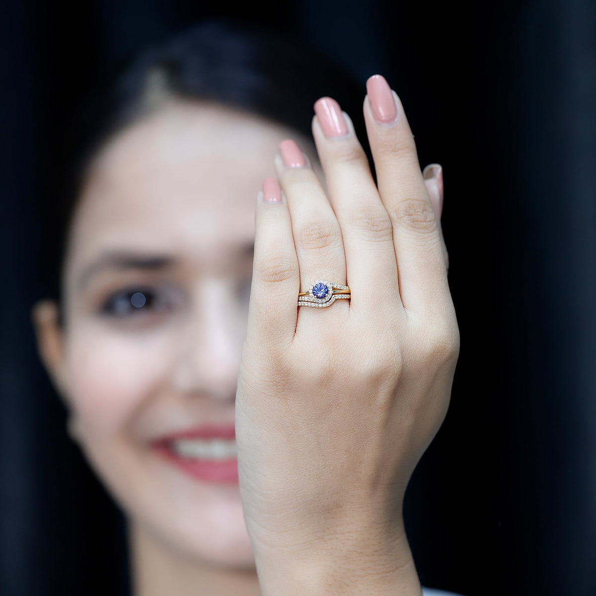 Genuine Tanzanite engagement ring with diamond enhancer featuring a deep blue Tanzanite gemstone and sparkling diamonds in a Rosec Jewels ring