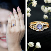 Genuine Tanzanite engagement ring with diamond enhancer by Rosec Jewels featuring a vibrant blue Tanzanite stone and sparkling diamonds.