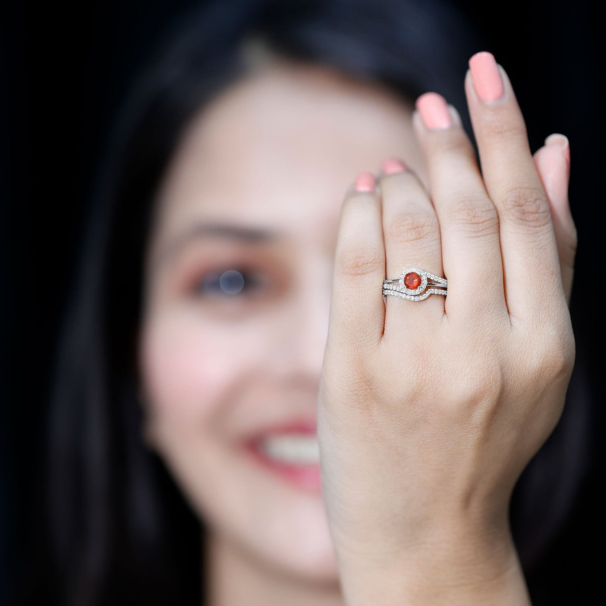 Certified fire opal engagement ring with diamond enhancer from Rosec Jewels, showcasing a vibrant fire opal and sparkling diamonds.