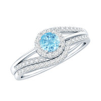 Certified real aquamarine engagement ring with diamond enhancer, featuring a silver band and intricate detailing, by Rosec Jewels.