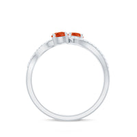 Rosec Jewels 3/4 CT fire opal and diamond engagement ring with a delicate band and sparkling gemstones.