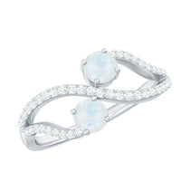 Minimal moonstone and diamond engagement ring from Rosec Jewels featuring a sleek design and sparkling gemstones.