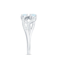 Minimal moonstone and diamond engagement ring by Rosec Jewels featuring a sleek, elegant design with a central moonstone and diamond accents.