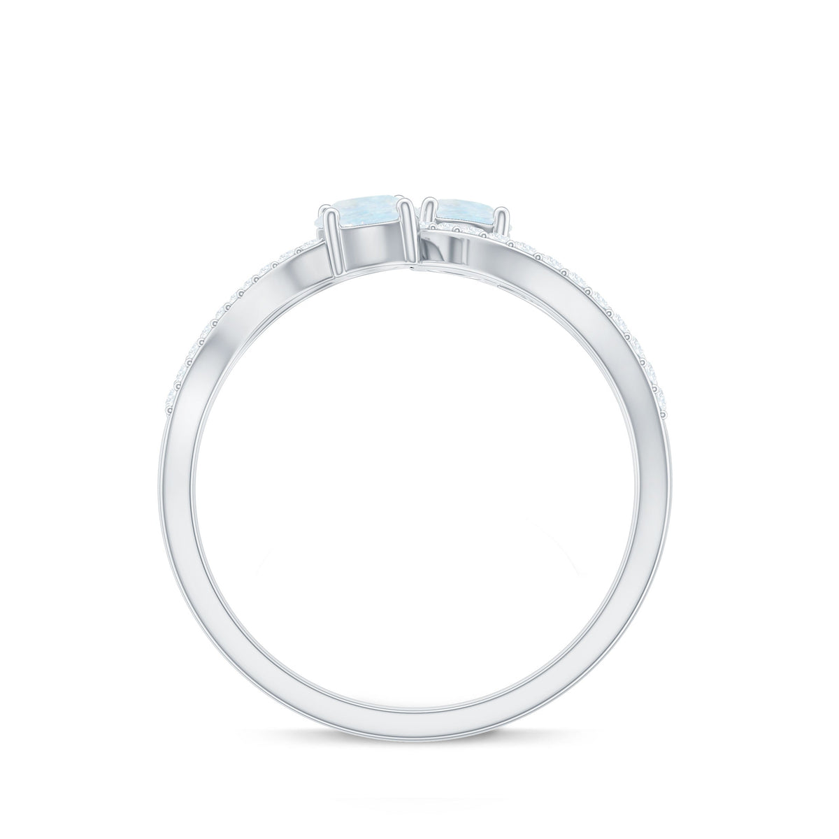 Minimal moonstone and diamond engagement ring from Rosec Jewels, showcasing a delicate band with a central moonstone and small diamonds.