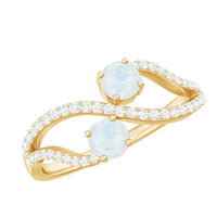 Minimal moonstone and diamond engagement ring from Rosec Jewels featuring a sleek silver band and sparkling gemstones.