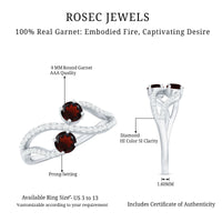 Natural garnet and diamond 2-stone engagement ring from Rosec Jewels featuring elegant gold band and sparkling gemstones.