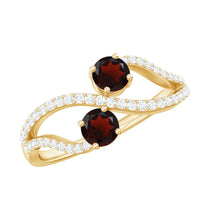 Natural garnet and diamond engagement ring from Rosec Jewels featuring two garnet stones set in a silver band.