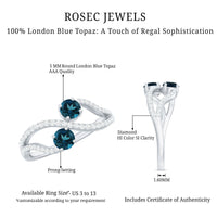 Rosec Jewels London Blue Topaz 2-stone promise ring with diamonds, featuring a sleek silver band and detailed gemstone setting.