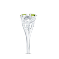 Natural Peridot Toi Et Moi ring with diamond infinity shank from Rosec Jewels, showcasing the elegant gemstone and intricate band design.