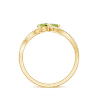 Natural Peridot Toi Et Moi ring with diamond infinity shank by Rosec Jewels, showcasing a green peridot gemstone and sparkling diamond details.