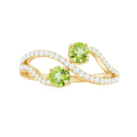 Natural Peridot Toi Et Moi ring with diamond infinity shank from Rosec Jewels, showcasing the green peridot and sparkling diamonds.