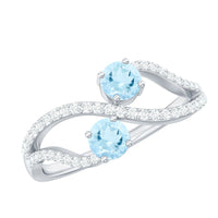 Rosec Jewels women's infinity promise ring featuring aquamarine stones and diamonds with a sleek, elegant design.