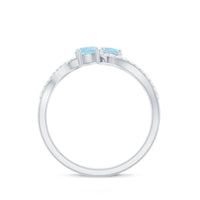 Rosec Jewels women's infinity promise ring with aquamarine stones and diamonds, featuring an elegant and delicate design.