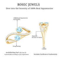 Aquamarine and diamond infinity promise ring for women by Rosec Jewels featuring two stones in elegant silver setting.