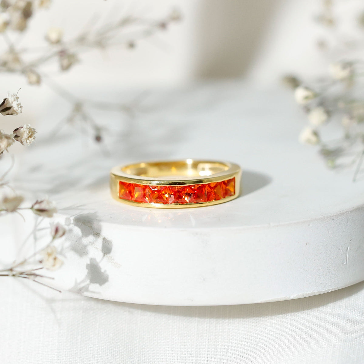 Princess Cut Lab Grown Orange Sapphire Half Eternity Band in Channel Set