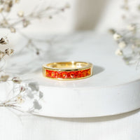 Princess Cut Lab Grown Orange Sapphire Half Eternity Band in Channel Set