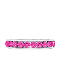 Rosec Jewels round lab-created pink sapphire half eternity ring with channel setting, showcasing sparkling pink sapphires on a polished band