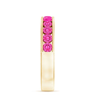 Rosec Jewels round lab-created pink sapphire half eternity ring with channel setting, showing a close-up of the band and sparkling gemstones.