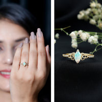 Ethiopian opal diamond engagement ring with Celtic knot design from Rosec Jewels, featuring a sparkling opal and intricate metalwork.