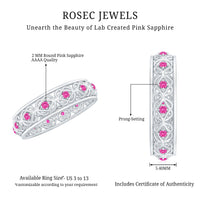 Rosec Jewels lab-created pink sapphire wedding band with Celtic design, featuring intricate details and a polished finish.