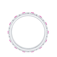 Rosec Jewels lab-created pink sapphire wedding band with Celtic details, showcasing intricate design and vibrant pink gemstones.