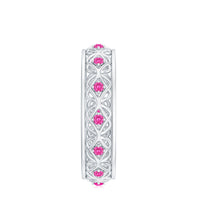 Rosec Jewels lab-created pink sapphire wedding band with Celtic detailing, showcasing intricate design and vibrant pink gemstones.