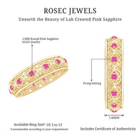 Rosec Jewels pink sapphire wedding band with Celtic details, showcasing a lab-created pink sapphire set in an intricate ring design.